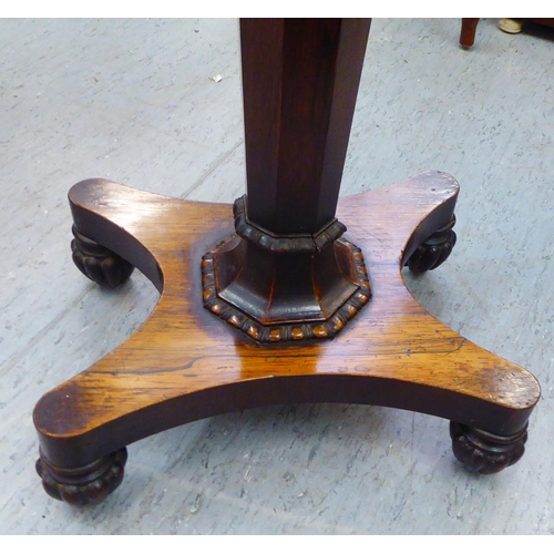 269 - A Regency rosewood teapoy, the removable top enclosing four caddies, over an octagonal tapered platf... 