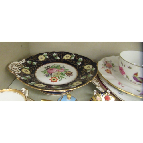 277 - 19thC and later porcelain tableware: to include a Coalport china pedestal dessert plate  9