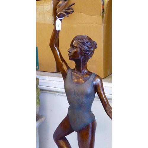 29 - A modern bronze effect composition figure, a ballerina  41