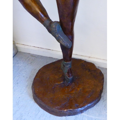 29 - A modern bronze effect composition figure, a ballerina  41