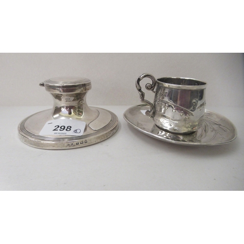 298 - Silver collectables: to include an Art Nouveau Continental coffee cup and saucer 