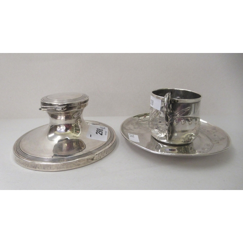 298 - Silver collectables: to include an Art Nouveau Continental coffee cup and saucer 