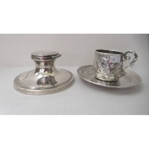 298 - Silver collectables: to include an Art Nouveau Continental coffee cup and saucer 