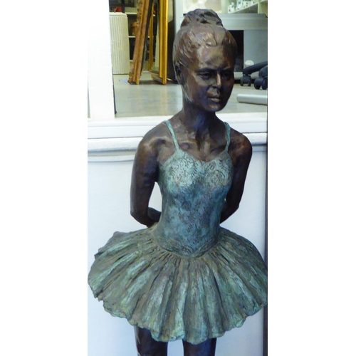 31 - A modern bronze effect composition figure, a ballerina  31