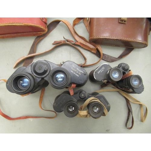 85 - Three pairs of vintage binoculars: to include RayLite 8x30  cased  