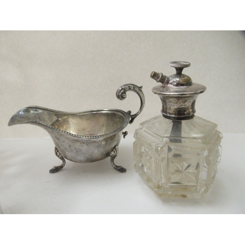 253 - Silver collectables: to include a sauce boat; and an atomizer  mixed marks