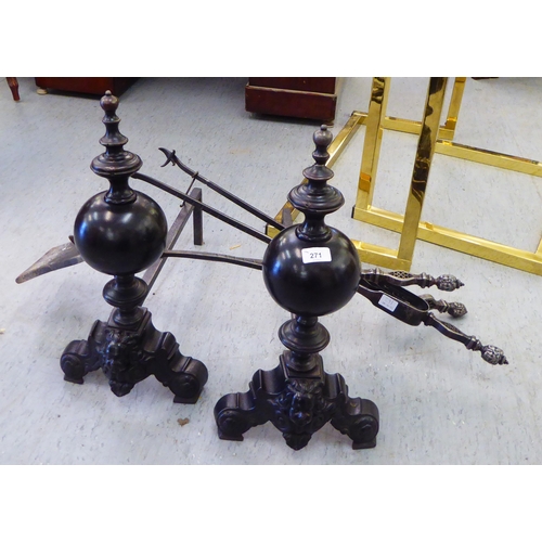 271 - A pair of cast iron andirons  22