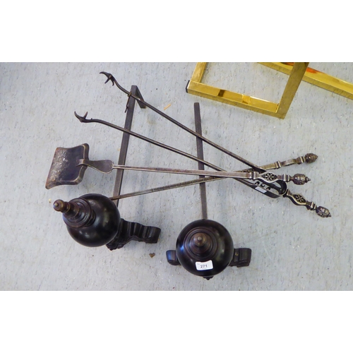 271 - A pair of cast iron andirons  22