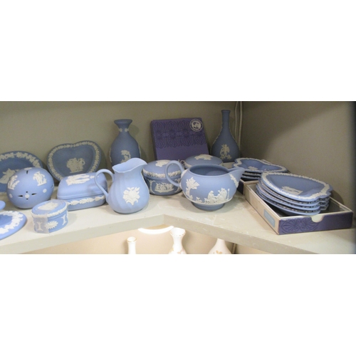 284 - Wedgwood powder blue Jasperware collectable: to include heart shaped pin dishes, vases and commemora... 