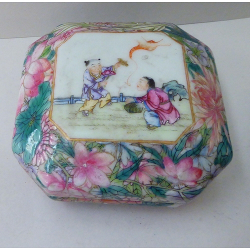 11 - Chinese collectables: to include a late 19thC Canton porcelain box and cover, decorated with figures... 