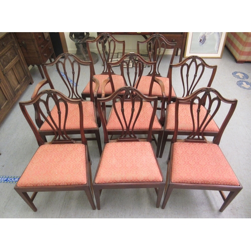 155 - A set of eight late 19th/early 20thC George III design mahogany framed dining chairs with arched bac... 