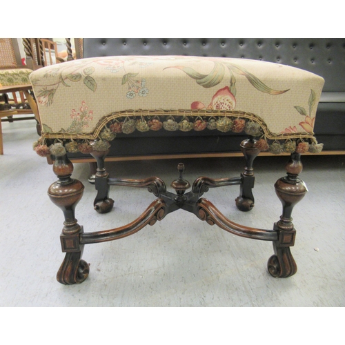 263 - A late 19thC walnut framed stool with a tapestry upholstered seat, raised on turned legs and splayed... 