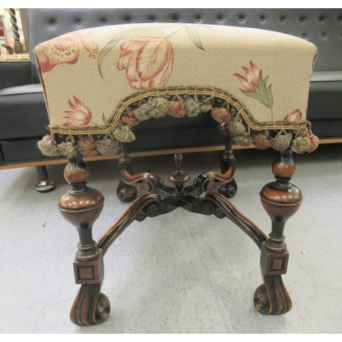 263 - A late 19thC walnut framed stool with a tapestry upholstered seat, raised on turned legs and splayed... 