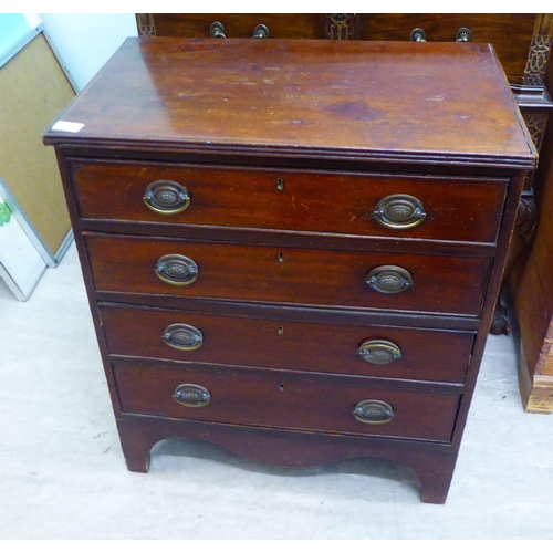 20 - An Edwardian Regency style mahogany four drawer dressing chest, raised on bracket feet  27