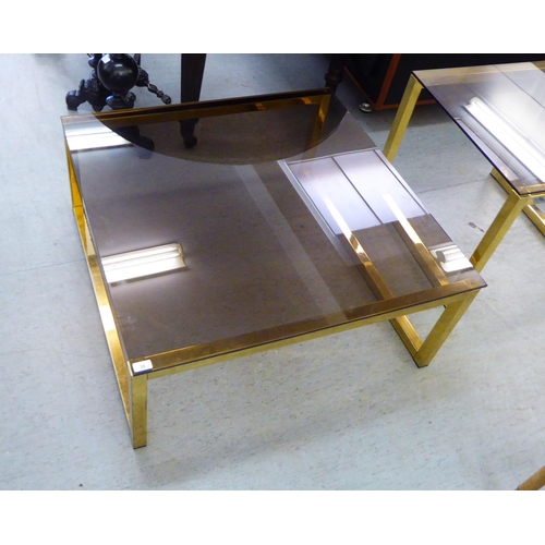 39 - Two modern lacquered brass framed coffee tables with smokey tinted glass tops  14