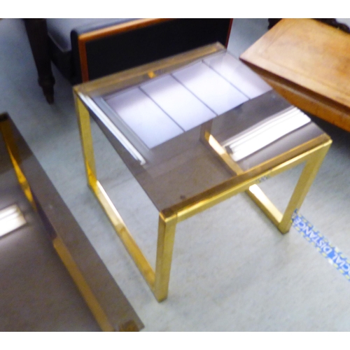 39 - Two modern lacquered brass framed coffee tables with smokey tinted glass tops  14