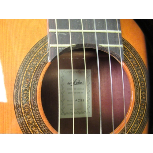 59 - An Aria AC-35 Concert Classical accoustic guitar  cased 