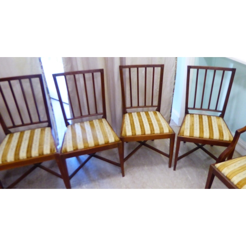 64 - A set of eight early 20thC Georgian design mahogany framed dining chairs, each with a slatted back a... 