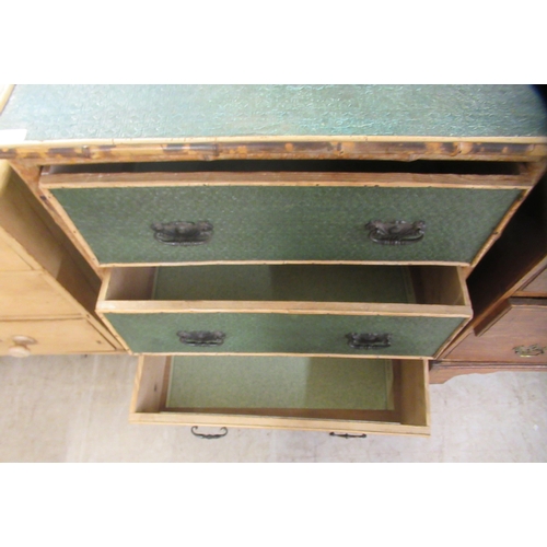 207 - An early 20thC bamboo framed three drawer dressing chest with embossed, green painted panels and iro... 