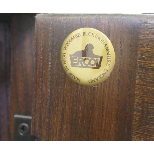 268 - An Ercol dark oak corner unit with three open shelves, over a base drawer, on a plinth  72