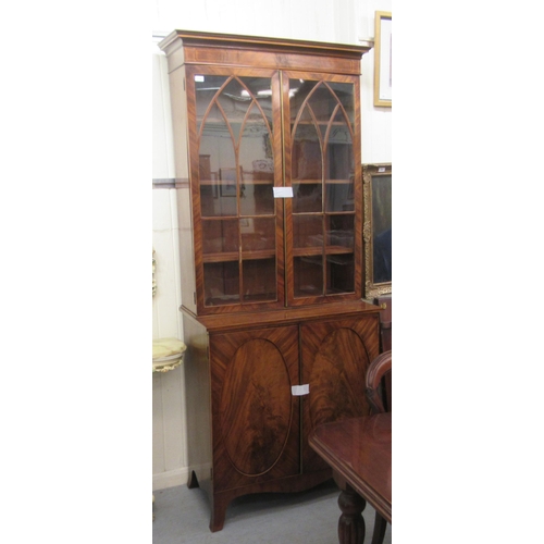 114 - An Edwardian string inlaid, crossbanded and mahogany veneered display cabinet with a pair of glazed ... 