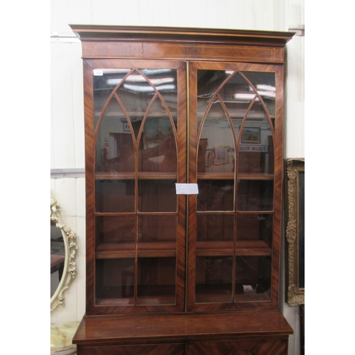 114 - An Edwardian string inlaid, crossbanded and mahogany veneered display cabinet with a pair of glazed ... 