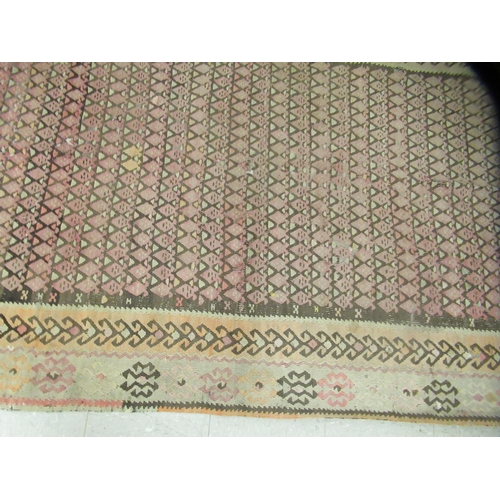 123 - Three rugs: to include a (probably) North African example, decorated with repeating designs in brigh... 