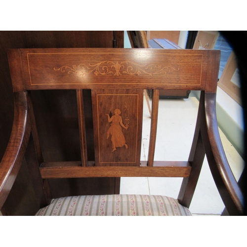 127 - A pair of Edwardian string inlaid and marquetry mahogany framed open arm chairs, the later floral pa... 