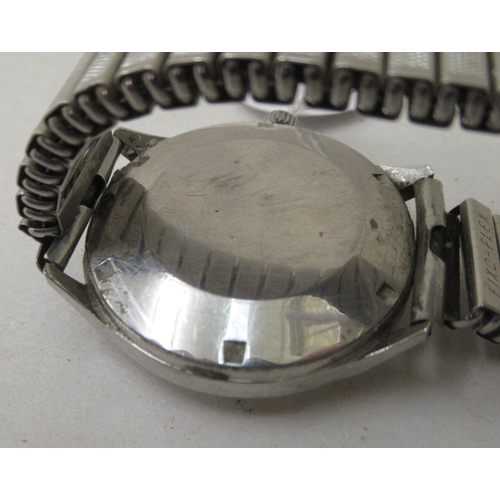 154 - A Doxa stainless steel cased bracelet watch, faced by a baton dial