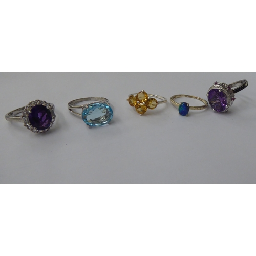 161 - Silver gilt and other dress rings, set with white and coloured stones 