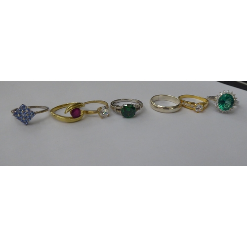 161 - Silver gilt and other dress rings, set with white and coloured stones 