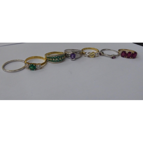 161 - Silver gilt and other dress rings, set with white and coloured stones 