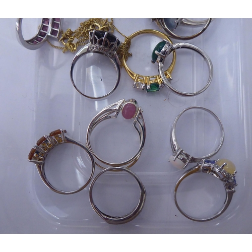 161 - Silver gilt and other dress rings, set with white and coloured stones 