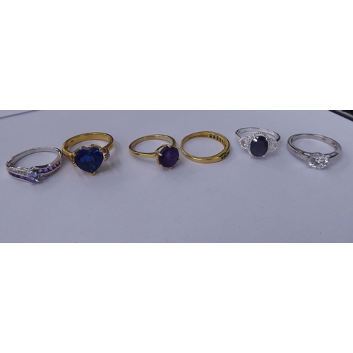 165 - Silver gilt and other dress rings, set with white and coloured stones 