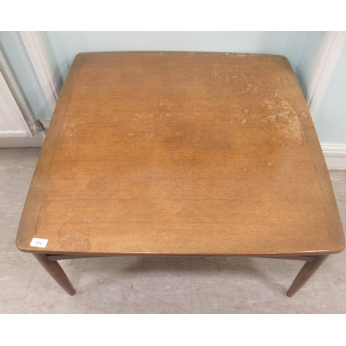 171 - A 1970s teak coffee table, the top with round corners, raised on turned legs  17