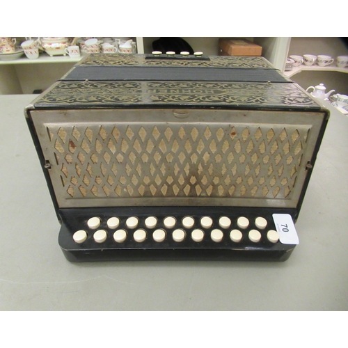 183 - A vintage twenty-one key Hohner piano accordion