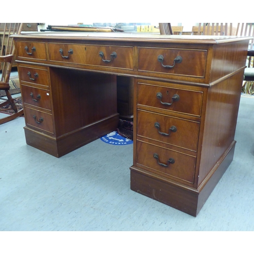 190 - A modern mahogany finished nine drawer twin pedestal desk  30