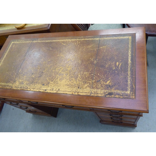 190 - A modern mahogany finished nine drawer twin pedestal desk  30