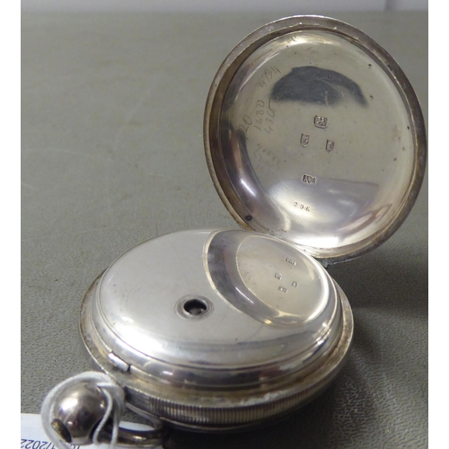 2 - A mid 19thC silver cased Waltham pocket watch, faced by a white enamel Roman dial with a subsidiary&... 