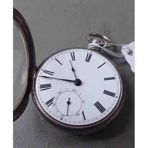 2 - A mid 19thC silver cased Waltham pocket watch, faced by a white enamel Roman dial with a subsidiary&... 