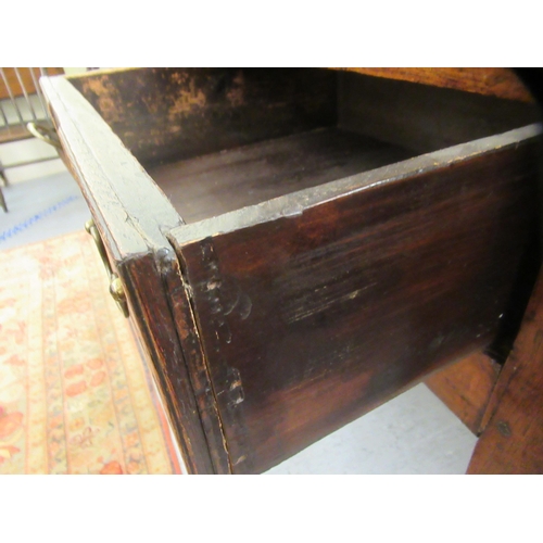 200 - A George III stained oak dresser, the superstructure with three open plate racks, over three inline ... 