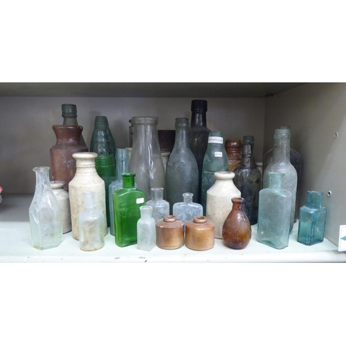 202 - Early/mid 19thC and later promotional and other stoneware and glass bottles 