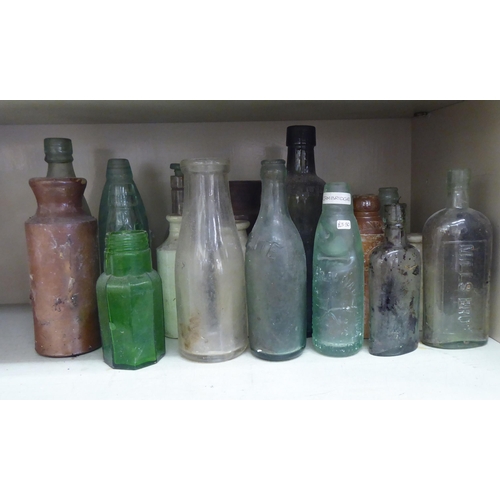 202 - Early/mid 19thC and later promotional and other stoneware and glass bottles 