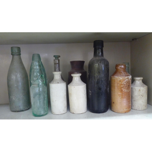 202 - Early/mid 19thC and later promotional and other stoneware and glass bottles 