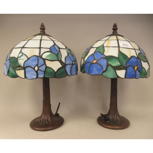 213 - A pair of modern Tiffany inspired lead glazed and bronze effect table lamps  13