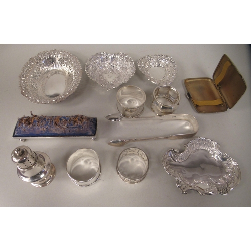 220 - Silver: to include four dissimilar napkin rings  mixed marks