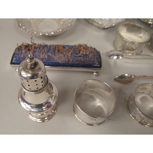 220 - Silver: to include four dissimilar napkin rings  mixed marks