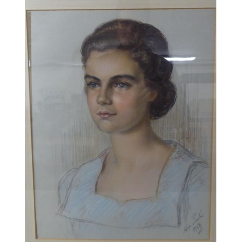 235 - Mid 20thC British School - a portrait of a young woman  pastel  bears an indistinct signat... 