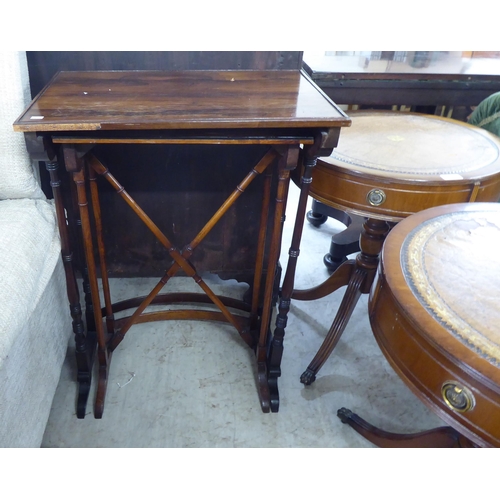 239 - Furniture: to include a pair of Regency style, mahogany framed, drum design occasional tables, raise... 