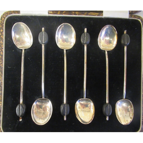 24 - A set of six silver teaspoons; a set of six bean and coffee spoons; and another set of six of plain ... 